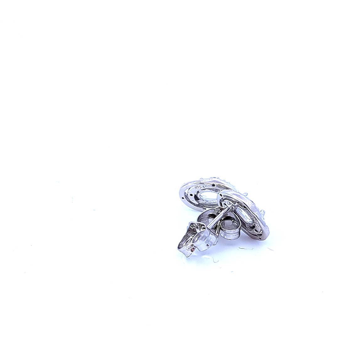 Aretes de plata de ley con topacio blanco de 0,44 quilates y halo de diamantes de 0,036 quilates