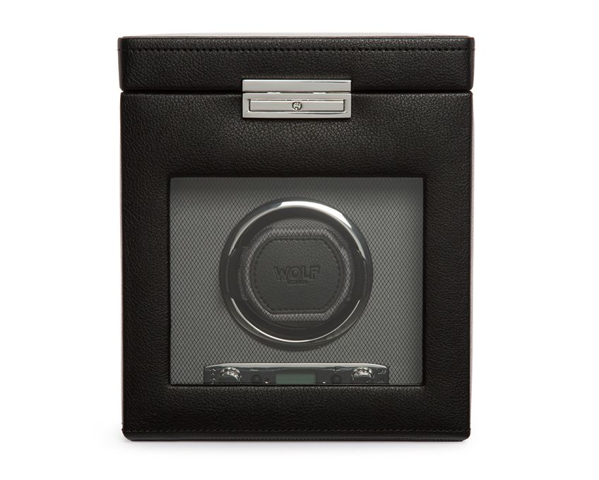 Black leather single watch winder with a visible control dial and branding on the front.