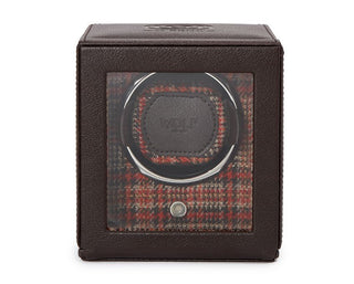 Brown leather watch winder with a checkered pattern on the front and a secure lock-in cuff for watches.