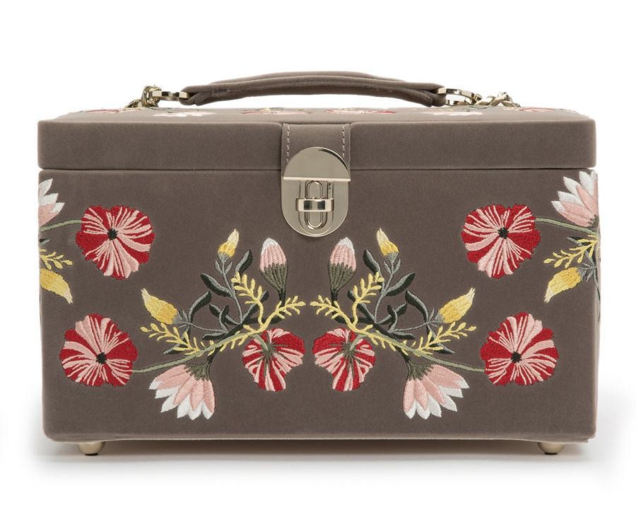 A medium-sized jewelry box with a floral embroidery design on the exterior, featuring a brown base color and pale gold hardware.