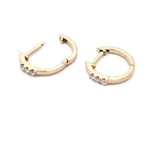 Aretes tipo argolla con diamantes de 0,08 quilates en oro amarillo de 14 quilates