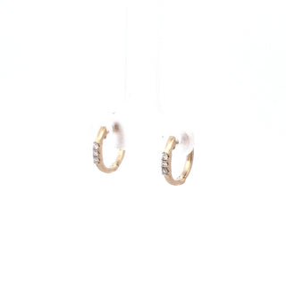 Aretes tipo argolla con diamantes de 0,08 quilates en oro amarillo de 14 quilates