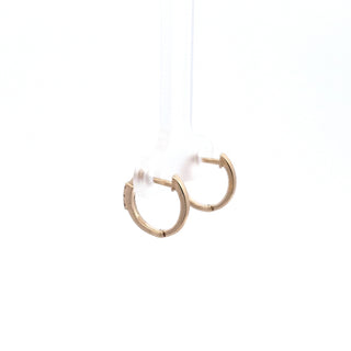 Aretes tipo argolla con diamantes de 0,08 quilates en oro amarillo de 14 quilates
