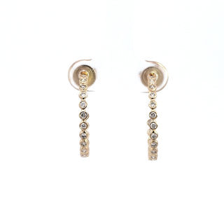 Aretes de diamantes de 0,35 quilates en oro amarillo de 14 quilates