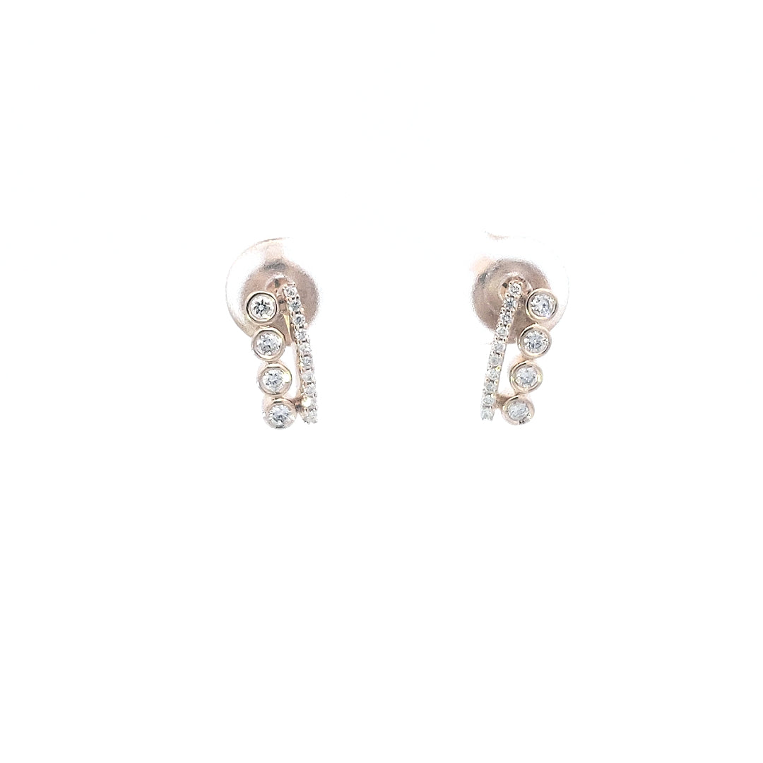 Aretes de diamantes de 0,20 quilates en oro amarillo de 14 quilates