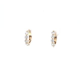 Aretes tipo argolla con diamantes de 0,49 quilates en oro amarillo de 14 quilates