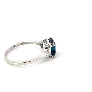 Anillo de oro blanco de 10 quilates, topacio azul Londres de talla cojín de 8 mm y diamante de 0,06 quilates - Talla 7