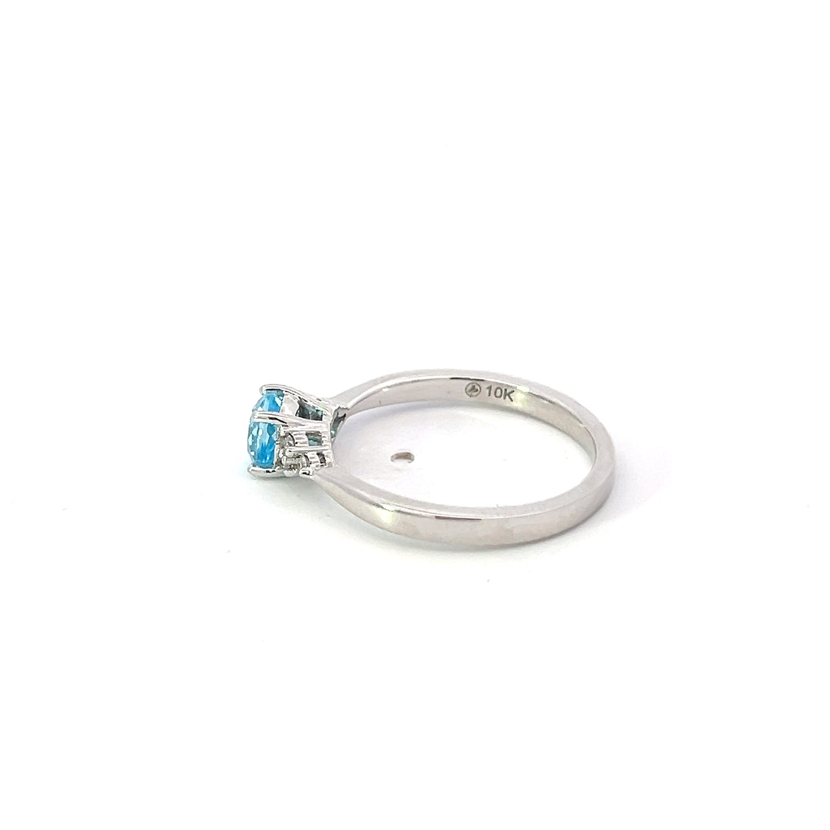 10K White Gold Blue Topaz and 0.06cttw Diamond Ring - Size 6