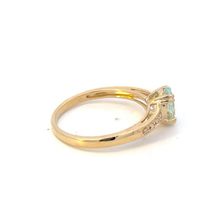 Anillo de oro amarillo de 10 quilates con aguamarina de 0,65 quilates y diamantes de 0,04 quilates, talla 7