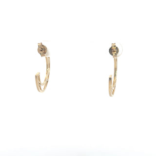 Aretes de eternidad dobles con diamantes de 0,10 quilates en oro blanco y amarillo de 10 quilates
