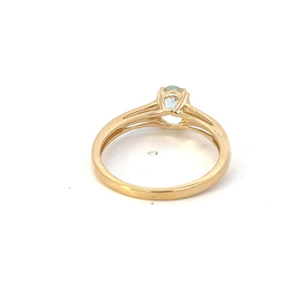 Anillo de oro amarillo de 10 quilates con aguamarina de 0,65 quilates y diamantes de 0,04 quilates, talla 7