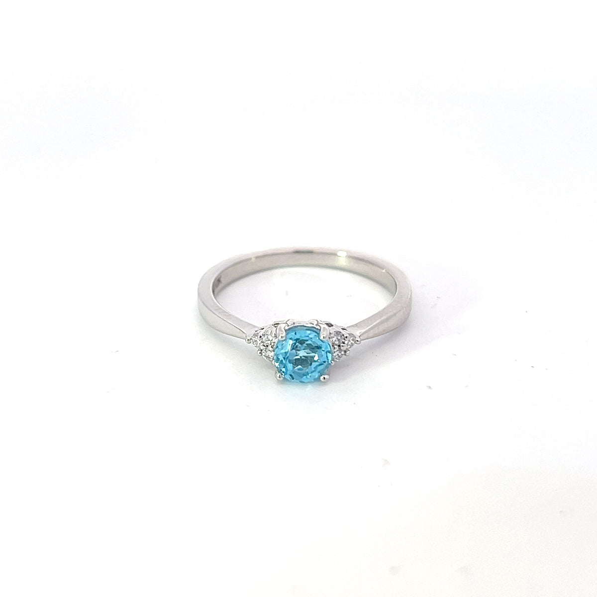 10K White Gold Blue Topaz and 0.06cttw Diamond Ring - Size 6