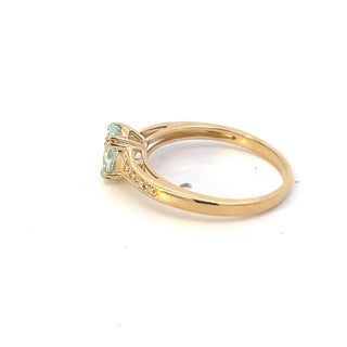 Anillo de oro amarillo de 10 quilates con aguamarina de 0,65 quilates y diamantes de 0,04 quilates, talla 7