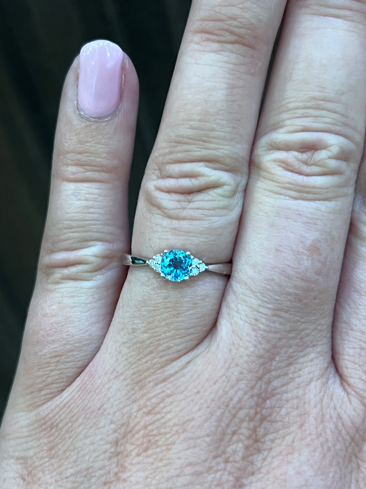 10K White Gold Blue Topaz and 0.06cttw Diamond Ring - Size 6