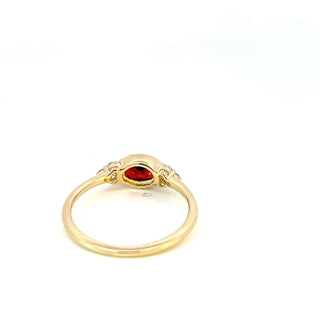 Tracking - 10K Yellow Gold 0.58cttw Genuine Garnet and 0.08cttw Diamond Ring