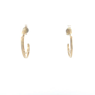 Aretes de eternidad dobles con diamantes de 0,10 quilates en oro blanco y amarillo de 10 quilates