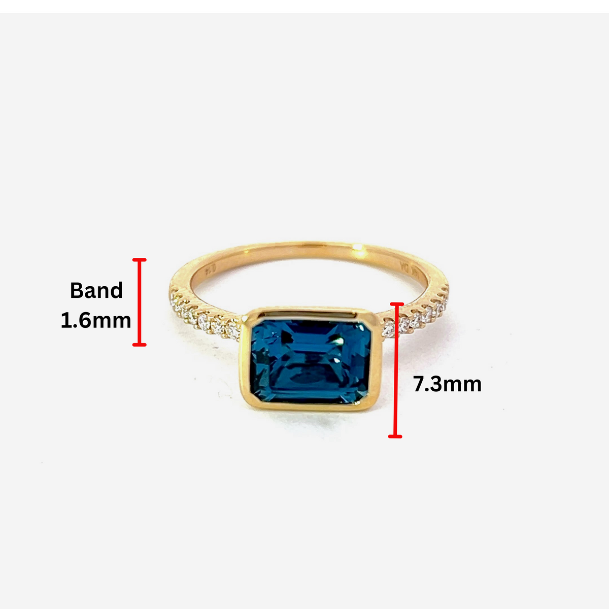 Anillo de oro amarillo de 14 quilates con topacio azul de 1,28 quilates y diamantes de 0,14 quilates - Talla 6
