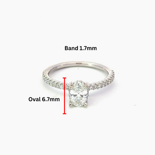 Anillo de compromiso de diamantes canadienses de talla ovalada de 0,78 quilates en oro blanco de 14 quilates
