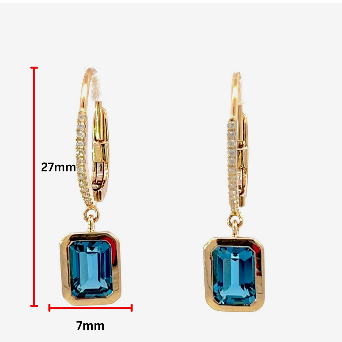 Aretes colgantes de diamantes y topacio azul en oro amarillo de 14 quilates