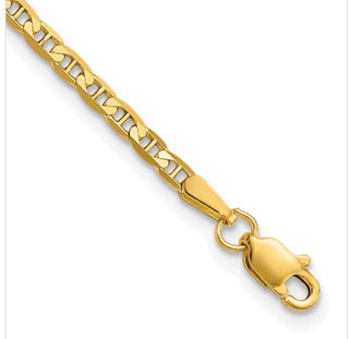 Gold chain bracelet with a clasp on a white background