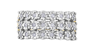 Silver ring with floral diamond design on a white background