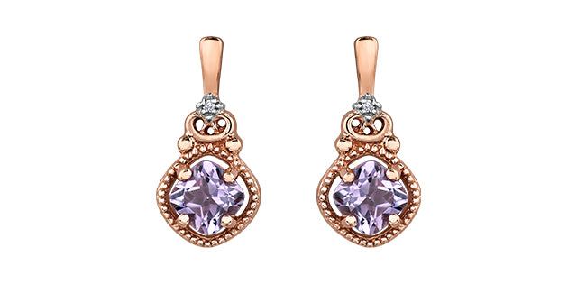 Rose gold earrings with purple gemstones on a white background