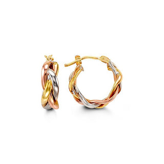 Pair of gold and silver hoop earrings on a white background