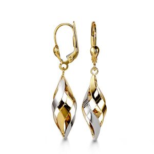 Gold and silver earrings on a white background