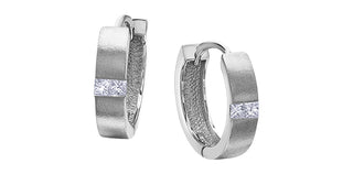 Pair of silver hoop earrings with embedded stones on a white background