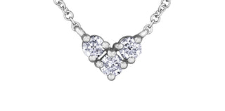 Diamond necklace with a heart-shaped pendant on a white background