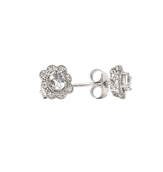 Pair of silver earrings with clear gemstones on a white background