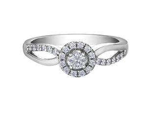 Silver ring with a diamond on a white background