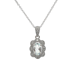 Silver pendant necklace with a clear gemstone on a white background