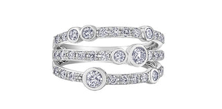 Stack of diamond rings on a white background