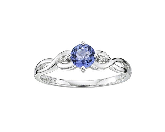 Silver ring with a blue gemstone on a white background