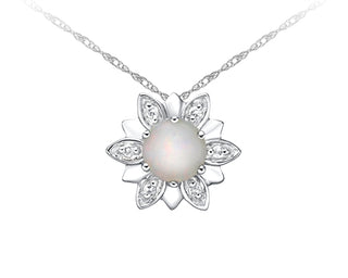 Pearl pendant necklace with diamond accents on a white background