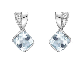 Silver earrings with clear gemstones on a white background
