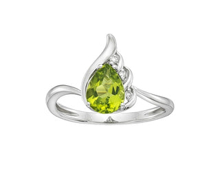 Silver ring with a green gemstone on a white background