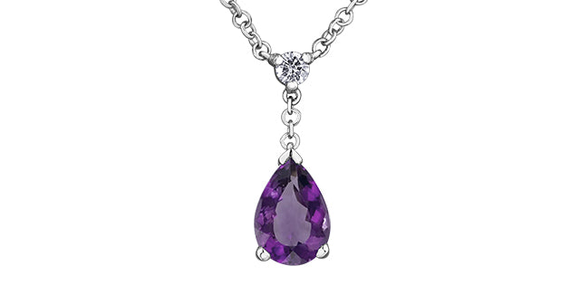 Purple teardrop gemstone necklace on a white background