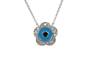 Necklace with a blue eye pendant on a white background