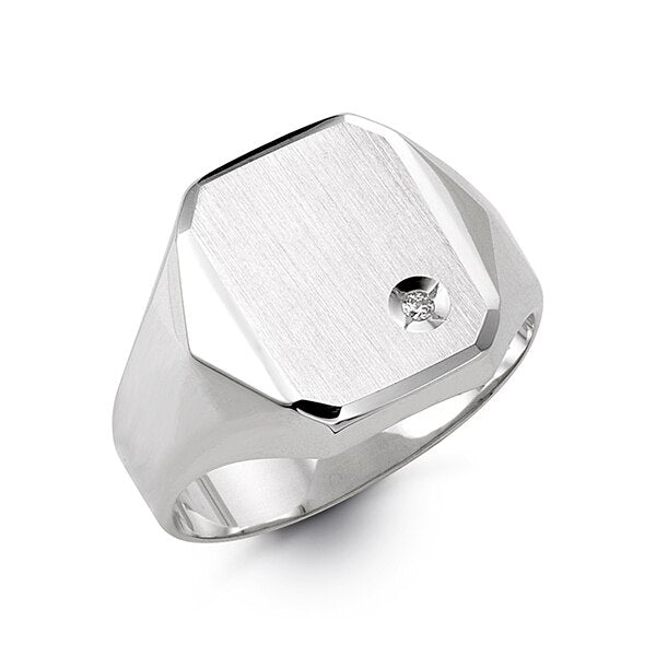 Silver ring with a diamond on a white background