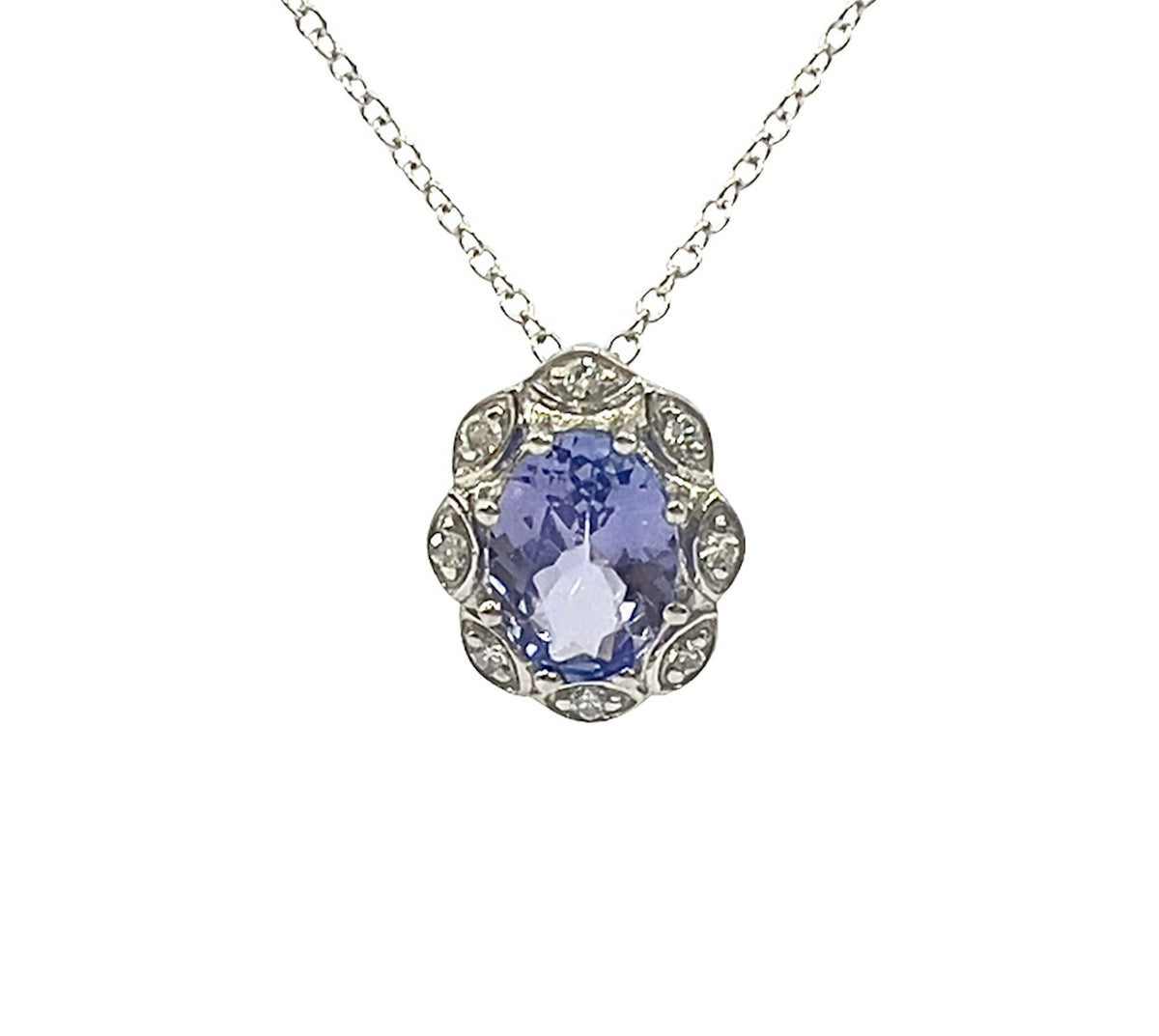 Silver necklace with a purple gemstone pendant on a white background