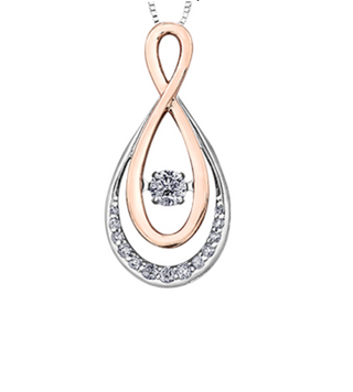 Two-tone infinity pendant with a diamond on a white background