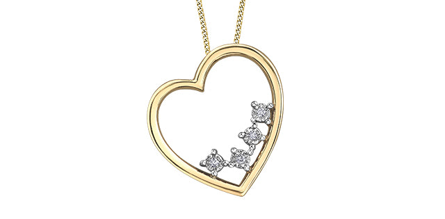 Gold heart-shaped necklace with embedded diamonds on a white background