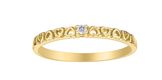 A 10K yellow gold diamond ring with a 0.15cttw of white diamonds set in a classic six-prong setting.