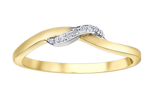 Gold ring with a diamond design on a white background