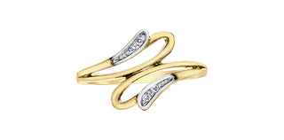 Gold ring with diamond accents on a white background