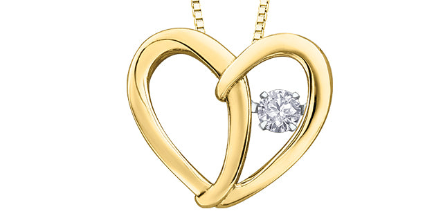 Gold heart-shaped pendant with a diamond on a white background