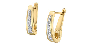 Gold hoop earrings with embedded diamonds on a white background