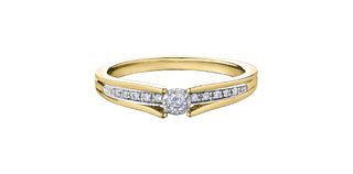 Gold ring with diamonds on a white background